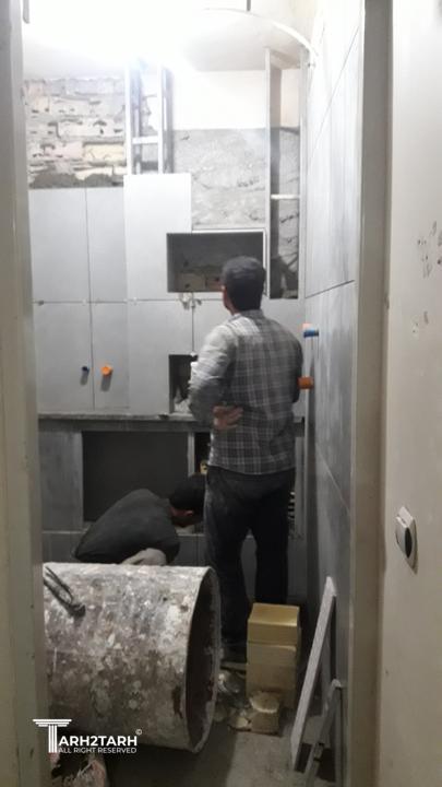 حمام در حال اجرا ، با بازشوهای پنهان 